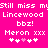 Pixelated text on bright pink background with repeated phrases and heart symbols, showing slight animation in the central heart's color.