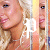 Pixelated static image of a woman's face with visible facial features and partial text overlay on the right side.