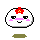 Two side-by-side pixel art frames of a round white character with pink cheeks, black eyes, and a red flower on its head against a gray background.