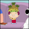 Animated cartoon character with pineapple-and-banana crown, red pants, yellow shirt on purple couch background.