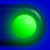A green glowing circular icon with a blue background transitions to a white sphere inside a dark blue rounded shape on the same blue background.