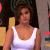 A pixelated image of a person in a white tank top against a blurred background with green text reading 'Original Icons .com' on the right.