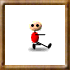 Pixelated character in red shirt and black pants performs walking animation across with consistent facial expression