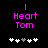 Pixelated pink text 'I Heart Tom' above five white and gray plus signs on black background, with one sign changing from white to gray between frames.