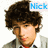 A pixelated image of a person with curly brown hair wearing a gray jacket over a white shirt and red tie, with the name 'Nick' displayed above their head in blue text.