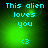 Green pixelated background with cyan text reading 'This alien loves you' and a heart symbol '<3', showing subtle animation changes in light patterns.