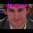 Pixelated image of a person with short brown hair wearing a dark jacket over a white shirt, overlaid with bright pink text reading 'devious' at the top.