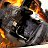 Animated sequence showing a vehicle on fire with flames and smoke, transitioning to a static text display reading 'BAD BOYS II' in white letters on black background.