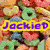 Pixelated image with colorful cereal, cupcake, and paint splatters, overlaid with purple text reading "JackieD Is So Awesome!" on yellow backgrounds.