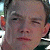 A pixelated image of a person's face on the left and green text reading 'Original Icons .com' on the right against a dark background.