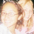 Pixelated image of a person with light brown hair and glasses, wearing a white top, with text reading 'best friend' in black pixelated font.