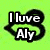 Green background with black-outlined heart shapes containing text and a heart drawn in sand.