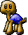 Pixelated cartoon character with tan body and blue shell-like back, shown in three poses with varying facial expressions and limb positions against gray background.