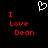 A black background displays red pixelated text reading "I Love Dean" with a white heart outline above the text, repeated side-by-side.