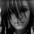 Black-and-white pixelated image of a person with short dark hair and bangs, wearing a dark top, against a dark background with vertical light stripes.