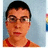 A pixelated image shows a person with short dark hair and glasses on the left, next to red text reading "I am McLoViN" above blue background.