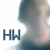 Pixelated image with blue 'HW' text on left, blurred figure on right, and white background.