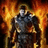 A pixelated figure in dark armor stands against a fiery orange and yellow background with no visible text or distinct facial features.