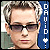 Pixelated portrait of a person with short brown hair, dark sunglasses, and red lips against a blue background with vertical white text.