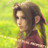 Pixelated static image of a person with long dark hair in profile, wearing reddish-brown clothing against a green-yellow background.