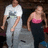 A static image with a blue background displaying text and a small photo of two people dancing.