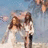 Pixelated image of two figures in white dresses on a beach with blue sky, split into four quadrants with green and gray sections containing text.