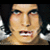 A 2x2 contact sheet of a pixelated animated icon featuring a character with dark hair, red text reading "Your Love Is A Razorblade Kiss... Sweetest Is The Taste From Your Lips...
", and a pink razor blade with heart cutouts.
