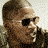 A 48x48 pixel animated contact sheet showing seven frames of a character with short hair and sunglasses, paired with text elements "TRUST NO ONE" and "THE KINGDOM" on black backgrounds.