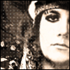 identical sepia-toned images showing a person with dark eye makeup, wearing a hat and patterned clothing, overlaid with text