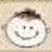 Pixelated icon of a smiling face with dark hair, set against a light beige background.