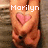 Pixelated image of hands forming a heart shape with a pink heart symbol, overlaid with text reading 'Marilyn', 'LOVES', and 'DESIREE' across three
