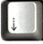 A pixelated square icon with a dark border containing a light gray background and a small downward-pointing arrow symbol.