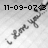 Static grayscale image showing a pixelated date stamp and abstract shapes resembling a sword or scythe on a light background.
