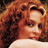 Static 48x48 pixel icon showing a close-up of a person with curly brown hair and light skin, cropped to the head and shoulders against a dark background.