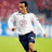 Pixelated image of a soccer player in white jersey and dark shorts running on a field, with text overlays identifying the player and team details.