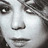 Pixelated grayscale close-up of a person's face with visible eyes, nose, and mouth features in a static 48x48 buddy icon format.
