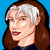 Pixelated character with silver hair and green eyes, brown hair, red lips, blue background, and a green 'Rogue' label in one view.