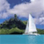 Pixelated static image of a sailboat on blue water with green landmass and cloudy sky background.