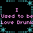 Pixelated text and symbols on a black background with cyan and pink elements arranged in a symmetrical pattern.