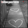 A black-and-white sidewalk scene with white chalk hearts drawn on the ground, each frame showing a heart outline that changes size and position across observations.