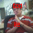 A person in a red and white striped shirt with hands clasped, overlaid with red text reading God He Is Saved Love You across four
