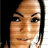 Static 48x48 pixel buddy icon showing a close-up of a person's face with light skin tone, dark hair, and neutral expression against black background.