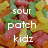 A pixelated image of colorful sour patch kids candies with overlaid text and symbols.