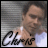 A pixelated image of a person in a white shirt with a signature-style text overlay, showing slight pose variation between frames.