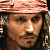 Pixelated close-up of a person wearing a light brown headband with dark brown stripes, long dark hair, and a neutral expression.