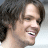 A 48x48 pixel buddy icon featuring a side-profile of a person with curly hair on the left and layered text blocks reading "NEW YORK MINUTE MAY 15" on the right, displayed as a static contact sheet frame.