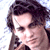 A 2x2 contact sheet of a pixelated animated icon featuring two frames of a person with dark wavy hair and a teal background with "CoolBuddy.com" text.