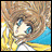 A pixelated anime-style character with brown hair and blue eyes on the left, next to a black background with white text reading "Anime IM" above smaller stylized text "c0m" on the right.