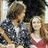 Pixelated image of two people with red text reading "cause dad" and "you aint funny" on light pink background.