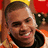 Pixelated image of a person in an orange and black outfit with a red and yellow background, next to pink text on black.